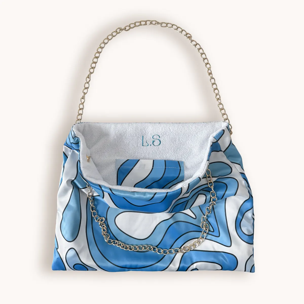 Sac-foulard-bleu-ciel-psea-k-leslie-sulman-vue-poche-logo-interieure-avec-initiales-brodées-personnalisé Sac-foulard-bleu-ciel-psea-k-leslie-sulman-vue-poche-logo-interieure-avec-initiales-brodées-personnalisé